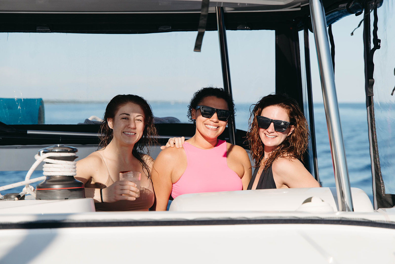 Meeting new people on your Alchemy Tulum Retreat and enjoying the sun on a boat day